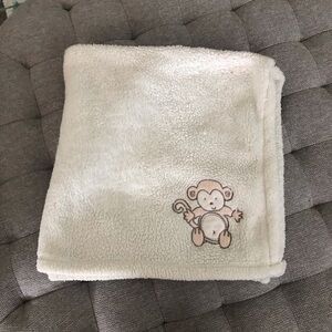 Fleece yellow monkey baby blanket